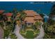 Luxury home with terracotta roof and beachfront location at 806 Columbus Dr, Tierra Verde, FL 33715