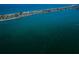 Aerial view of the neighborhood and coastline at 806 Columbus Dr, Tierra Verde, FL 33715