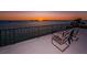 Balcony with sunset views over the water at 806 Columbus Dr, Tierra Verde, FL 33715