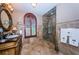 Large bathroom with walk-in shower, granite countertop, and window at 806 Columbus Dr, Tierra Verde, FL 33715