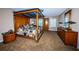 Spacious main bedroom with a large four-poster bed and ample closet space at 806 Columbus Dr, Tierra Verde, FL 33715