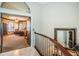 Bedroom view from the top of the staircase showing the entry to the open space at 806 Columbus Dr, Tierra Verde, FL 33715