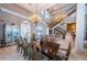 Spacious dining room, perfect for entertaining, with large chandelier and high ceilings at 806 Columbus Dr, Tierra Verde, FL 33715