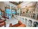 Grand two story entryway with marble floors and elegant staircase at 806 Columbus Dr, Tierra Verde, FL 33715