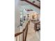 Grand marble foyer featuring a stunning chandelier, staircase, and access to the living spaces at 806 Columbus Dr, Tierra Verde, FL 33715