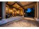 Elegant home entrance with double doors, stone steps, and lighting at 806 Columbus Dr, Tierra Verde, FL 33715