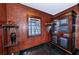 Small hallway with decorative wooden cabinet and textured walls at 806 Columbus Dr, Tierra Verde, FL 33715