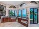 Kitchen with water views, farmhouse sink, and built-in appliances at 806 Columbus Dr, Tierra Verde, FL 33715