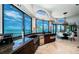 Gourmet kitchen featuring granite countertops, stainless steel appliances, and stunning water views at 806 Columbus Dr, Tierra Verde, FL 33715
