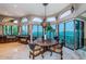 Gourmet kitchen with island, stainless steel appliances, and water views at 806 Columbus Dr, Tierra Verde, FL 33715