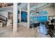 Open living room with ocean view, fireplace, and comfortable seating at 806 Columbus Dr, Tierra Verde, FL 33715
