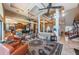 Spacious living room with high ceilings, water views, and seating area at 806 Columbus Dr, Tierra Verde, FL 33715