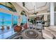 Living room with water views and kitchen access at 806 Columbus Dr, Tierra Verde, FL 33715
