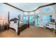 Luxurious main bedroom with water views and en-suite bathroom at 806 Columbus Dr, Tierra Verde, FL 33715