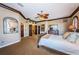 Lovely main bedroom with coffered ceilings, elegant furnishings, and plenty of natural light at 806 Columbus Dr, Tierra Verde, FL 33715
