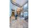 Two-story foyer with chandelier and marble floors at 806 Columbus Dr, Tierra Verde, FL 33715