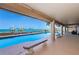 Beautiful waterfront pool overlooking tranquil turquoise waters and lush tropical landscaping at 806 Columbus Dr, Tierra Verde, FL 33715