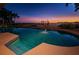 Waterfront pool with a vivid sunset view and lush landscaping near the water at 806 Columbus Dr, Tierra Verde, FL 33715