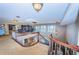 Spacious upper landing with a built-in bookshelf and seating area at 806 Columbus Dr, Tierra Verde, FL 33715