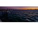 Expansive waterfront view showcasing calm waters and a picturesque sunset, ideal for relaxation and recreation at 806 Columbus Dr, Tierra Verde, FL 33715