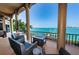 Relaxing waterfront patio with seating area and stunning water views at 806 Columbus Dr, Tierra Verde, FL 33715