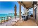 Enjoy breathtaking water views from this patio, complete with seating and umbrella at 806 Columbus Dr, Tierra Verde, FL 33715