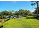 Overlooks condo building and green space at 36750 Us Highway 19 N # 22208, Palm Harbor, FL 34684