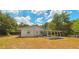 Older home needing renovations, with screened porch at 8194 Wpa Rd, Brooksville, FL 34601