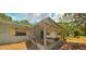 Ranch-style home with screened porch and mature trees at 8194 Wpa Rd, Brooksville, FL 34601