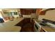 Kitchen with wood cabinets and laminate countertops at 8194 Wpa Rd, Brooksville, FL 34601