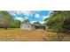 Single story home with a screened porch and large backyard at 8194 Wpa Rd, Brooksville, FL 34601