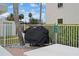 Community grill with cover, ready for use at 300 Woodette Dr # 203, Dunedin, FL 34698