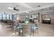 Relaxing lounge area with seating and a piano at 300 Woodette Dr # 203, Dunedin, FL 34698