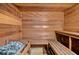 Clean sauna with wooden walls and benches at 300 Woodette Dr # 203, Dunedin, FL 34698
