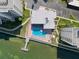 Aerial of condo building pool and dock at 300 Woodette Dr # 203, Dunedin, FL 34698