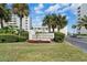 Island Towers building entrance sign at 300 Woodette Dr # 203, Dunedin, FL 34698