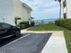 Guest parking area with ocean view at 300 Woodette Dr # 203, Dunedin, FL 34698