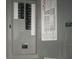 Close up view of the home's electrical breaker panel at 300 Woodette Dr # 203, Dunedin, FL 34698