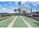 Community shuffleboard courts near the waterfront at 300 Woodette Dr # 203, Dunedin, FL 34698