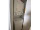 Stackable washer and dryer in a dedicated closet at 300 Woodette Dr # 203, Dunedin, FL 34698
