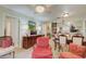 Living room with a view of the dining area and patio at 6428 Gloria Dr # 15, New Port Richey, FL 34653