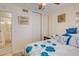 Bedroom with queen bed, ceiling fan and access to bathroom at 6428 Gloria Dr # 15, New Port Richey, FL 34653