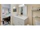 Bathroom with vanity, toilet and view into bedroom at 6428 Gloria Dr # 15, New Port Richey, FL 34653