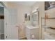 Clean bathroom with vanity and view into bedroom at 6428 Gloria Dr # 15, New Port Richey, FL 34653