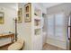 Well-lit laundry area with washer, dryer, and storage shelves at 6428 Gloria Dr # 15, New Port Richey, FL 34653