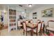Bright dining room with charming wooden table and chairs at 6428 Gloria Dr # 15, New Port Richey, FL 34653