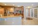 Kitchen with granite counters, stainless steel appliances and access to the foyer at 11 San Marco St # 903, Clearwater, FL 33767