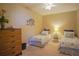 Twin bedroom with coastal decor and cheerful atmosphere at 11 San Marco St # 903, Clearwater, FL 33767