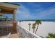 Balcony overlooking the beach and pier with ocean views at 11 San Marco St # 903, Clearwater, FL 33767