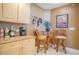 Small kitchen area with granite countertop and breakfast nook at 11 San Marco St # 903, Clearwater, FL 33767